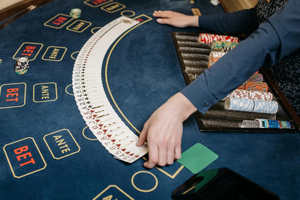 A Dealer Spreading the Playing Cards